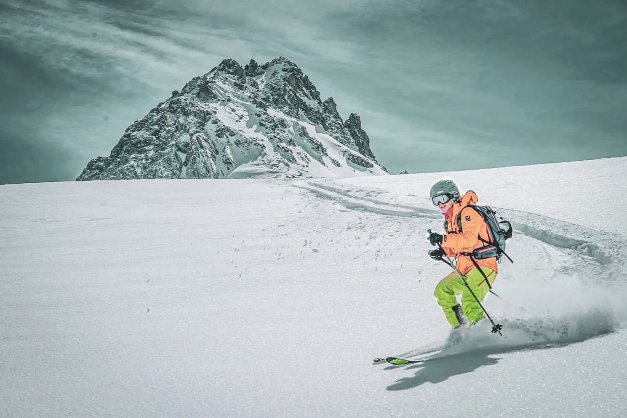Ski touring in untouched snow, with majestic scenery around Mont Blanc.