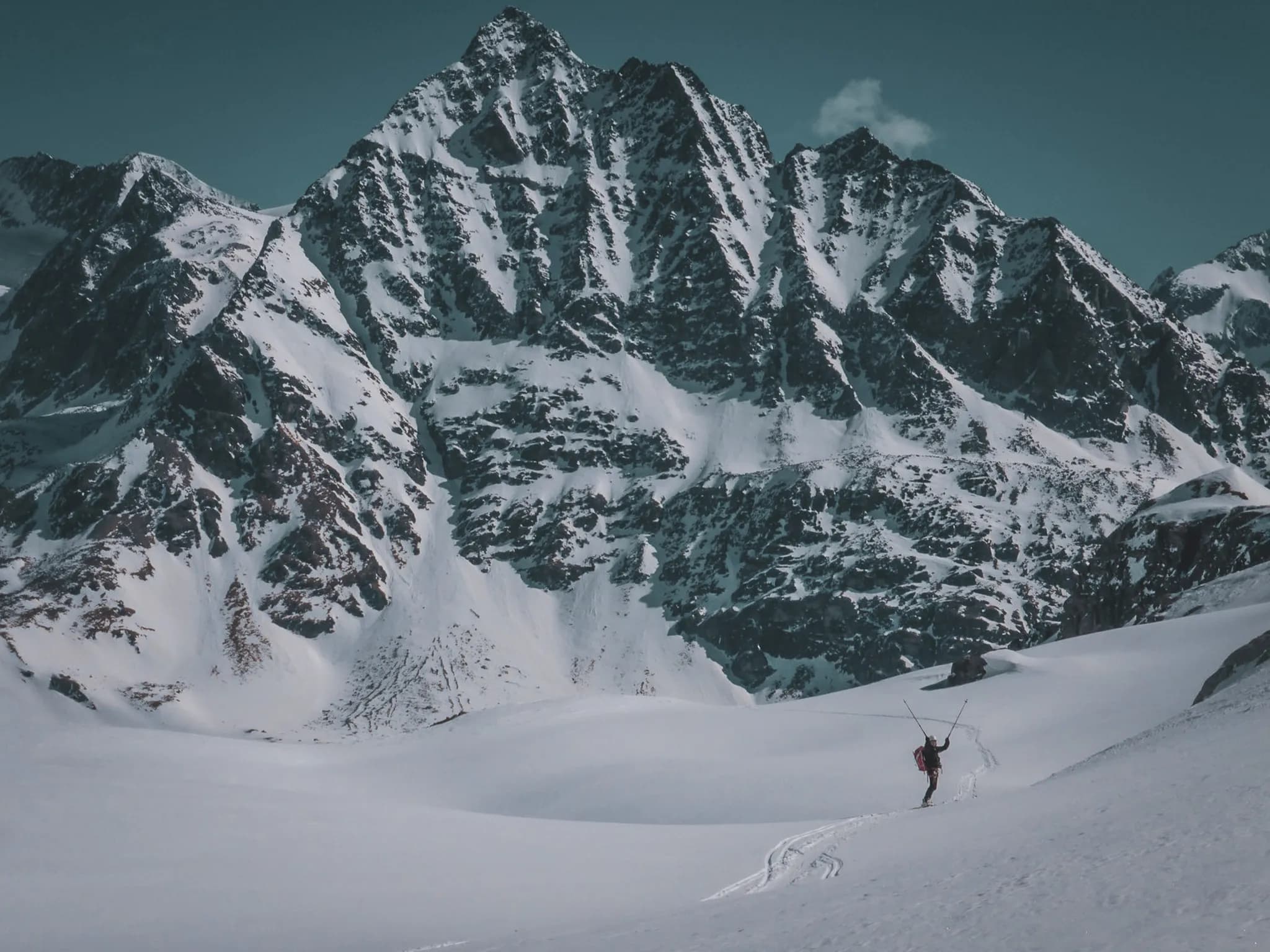 A happy ski tourer on the Chamonix-Zermatt Haute Route with Wildhartt.