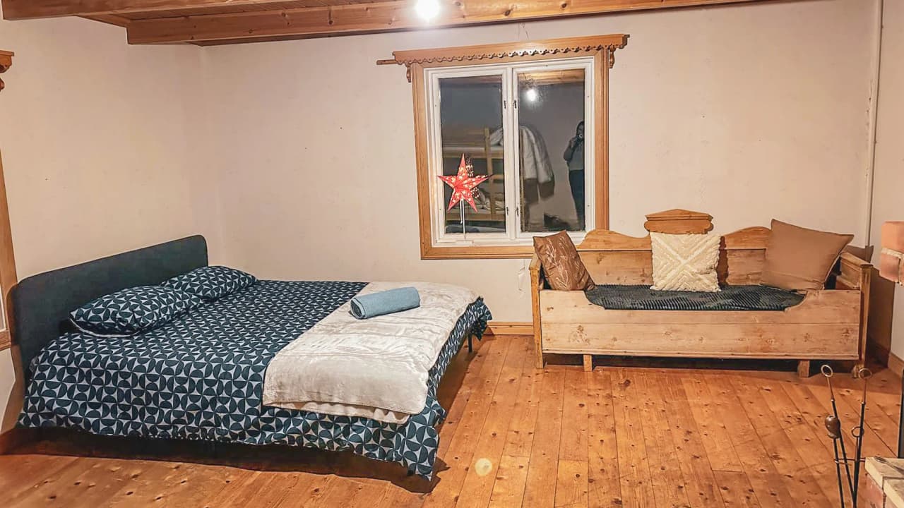 A cozy room in Lapland, with modern comforts and a Nordic touch, perfect for a magical getaway.