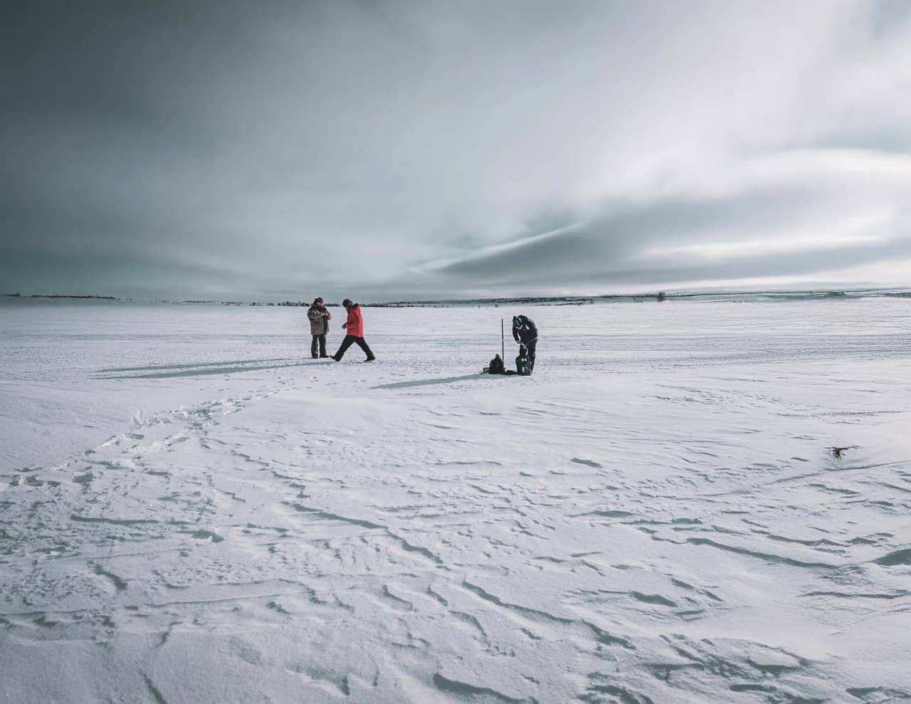 Two adventurers explore a snowy landscape, offering a magical escapade in Lapland.