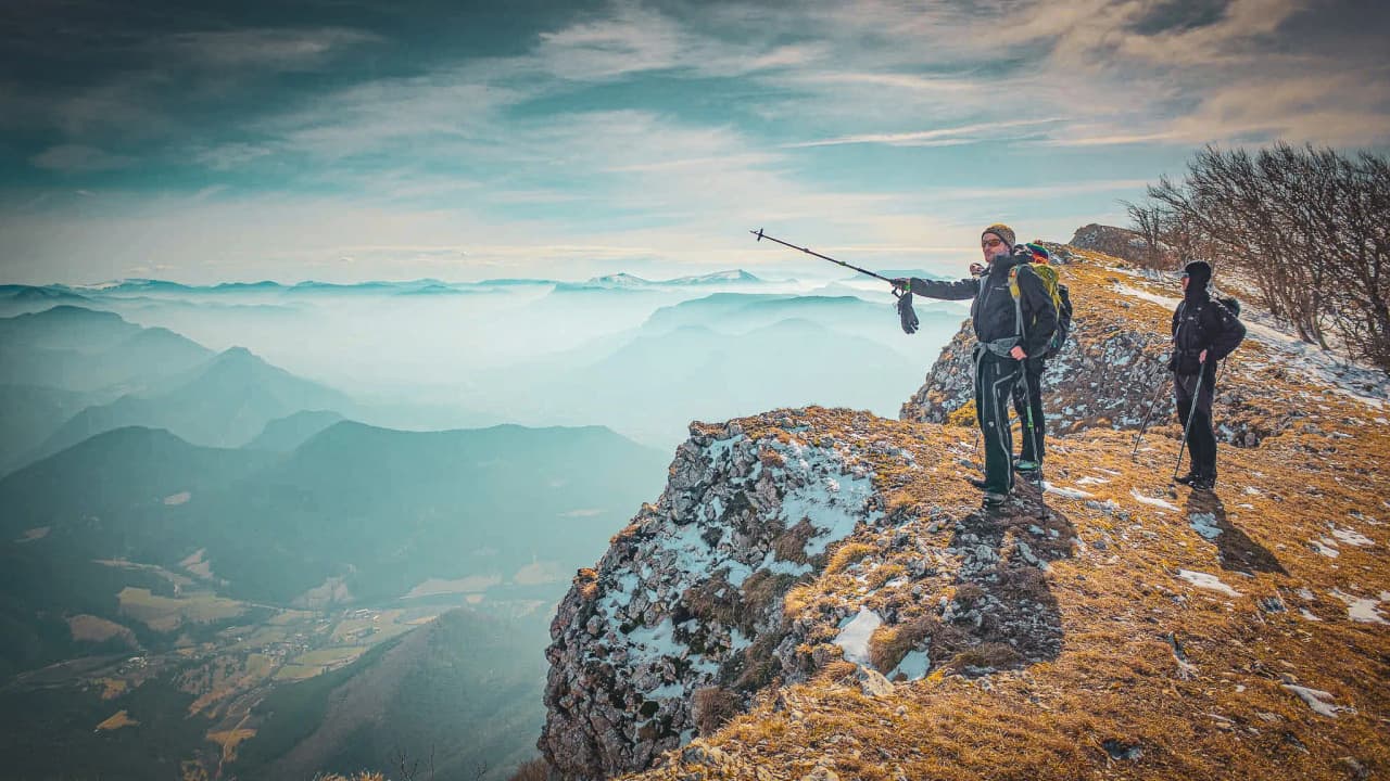 Group hike to a sunny summit with spectacular mountain views.