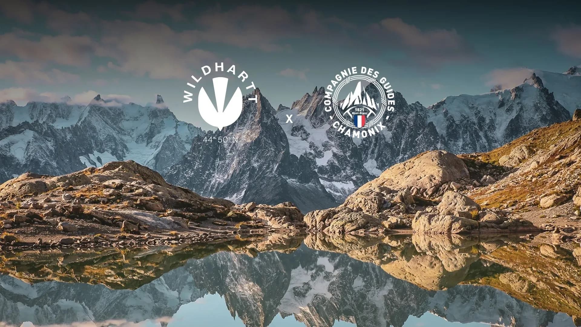 Majestic mountains and reflecting lakes form an enchanting alpine adventure landscape.