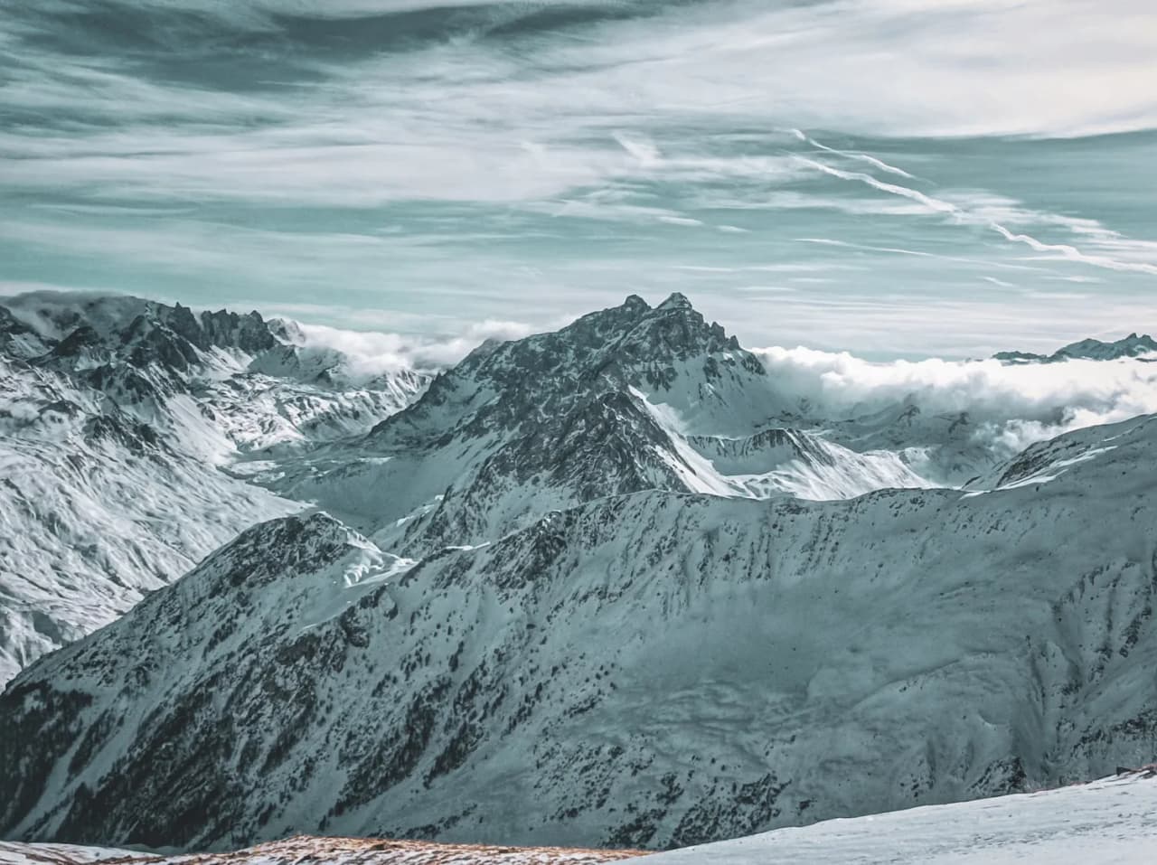 A panoramic view of the snow-capped mountains, a magnificent landscape between France and Italy.