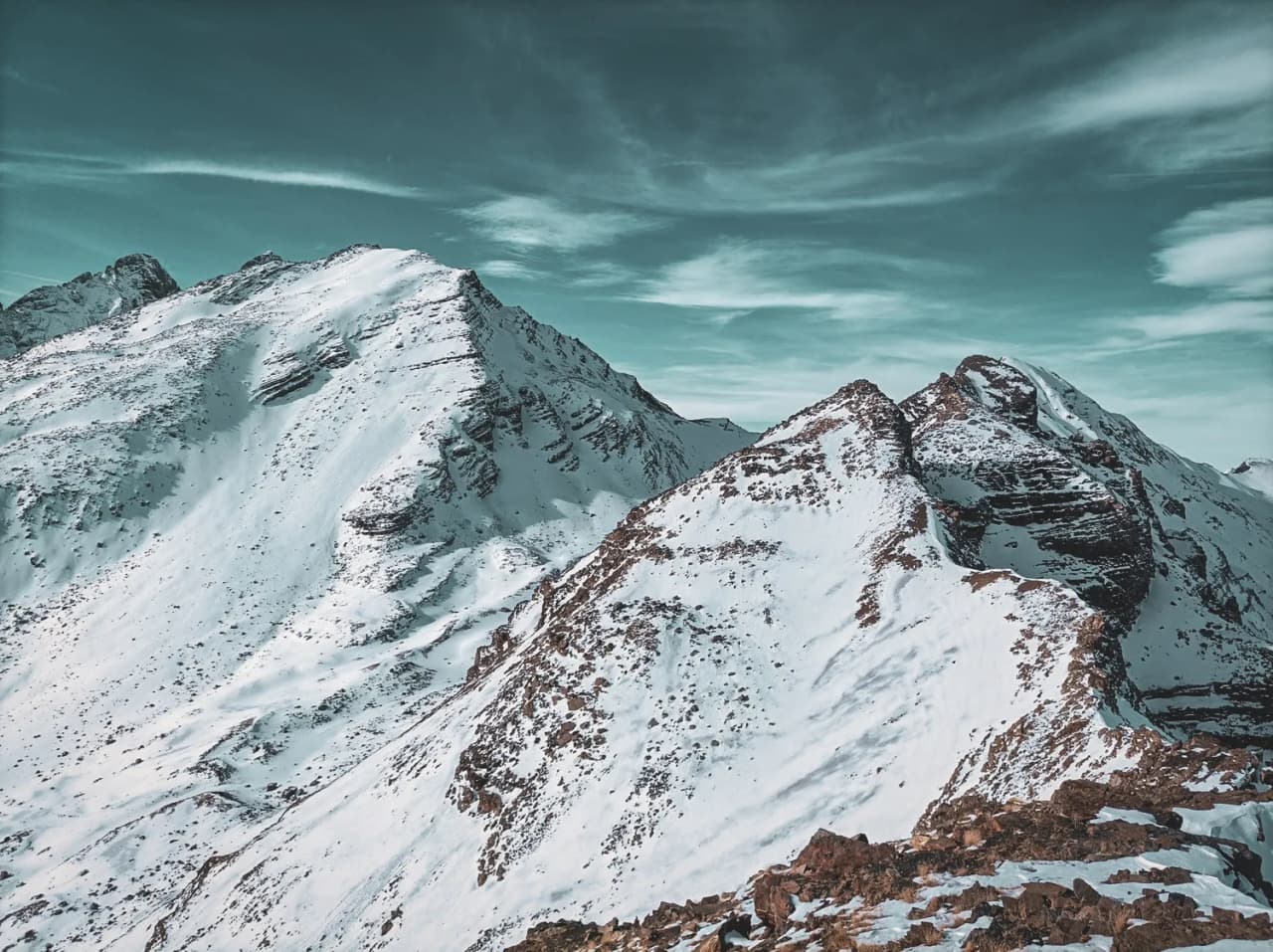 A majestic landscape of snow-capped mountains, an invitation to adventure between France and Italy.