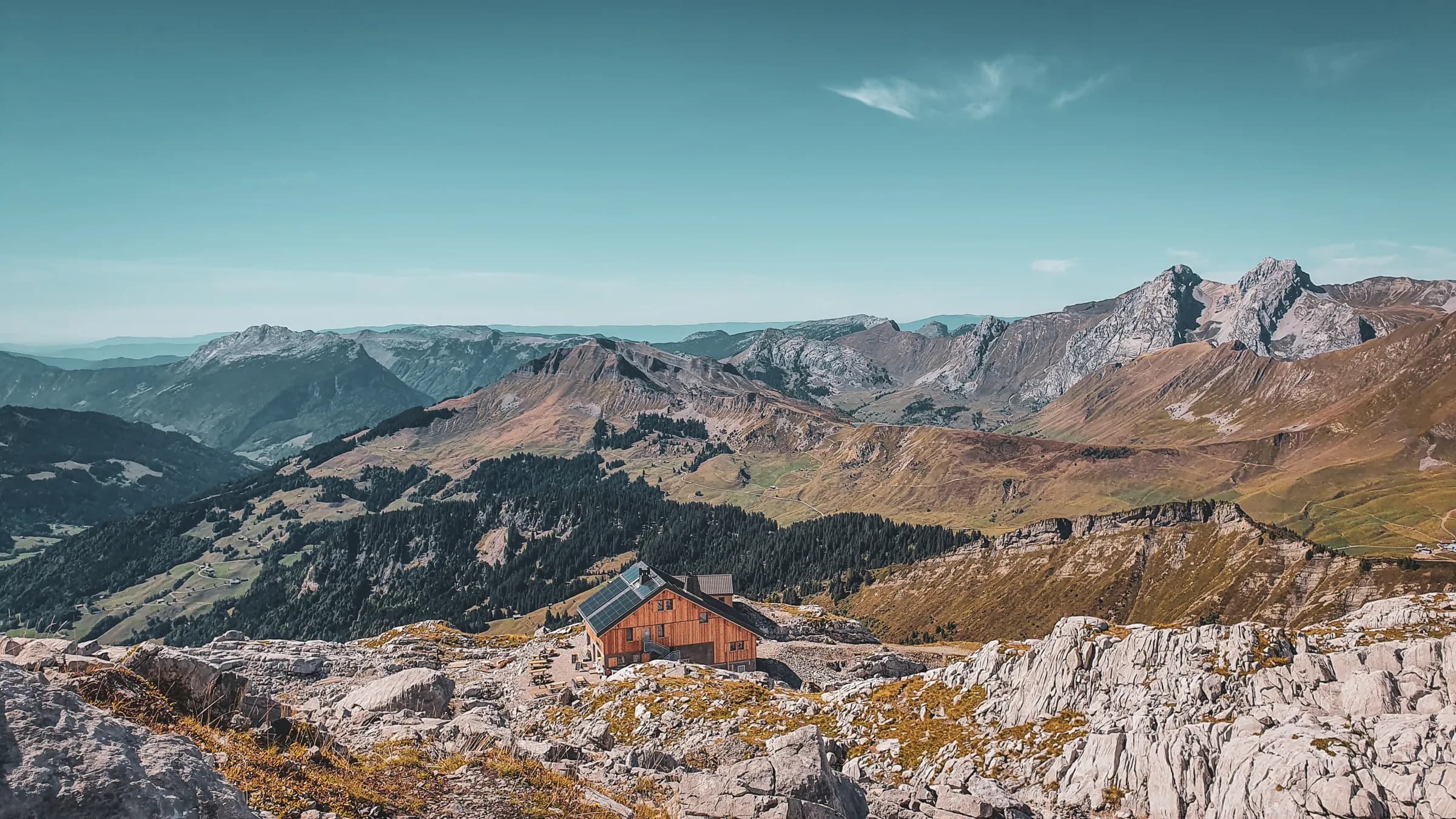 Mountain hut nestled between majestic peaks, breathtaking scenery and the Aravis mountains.