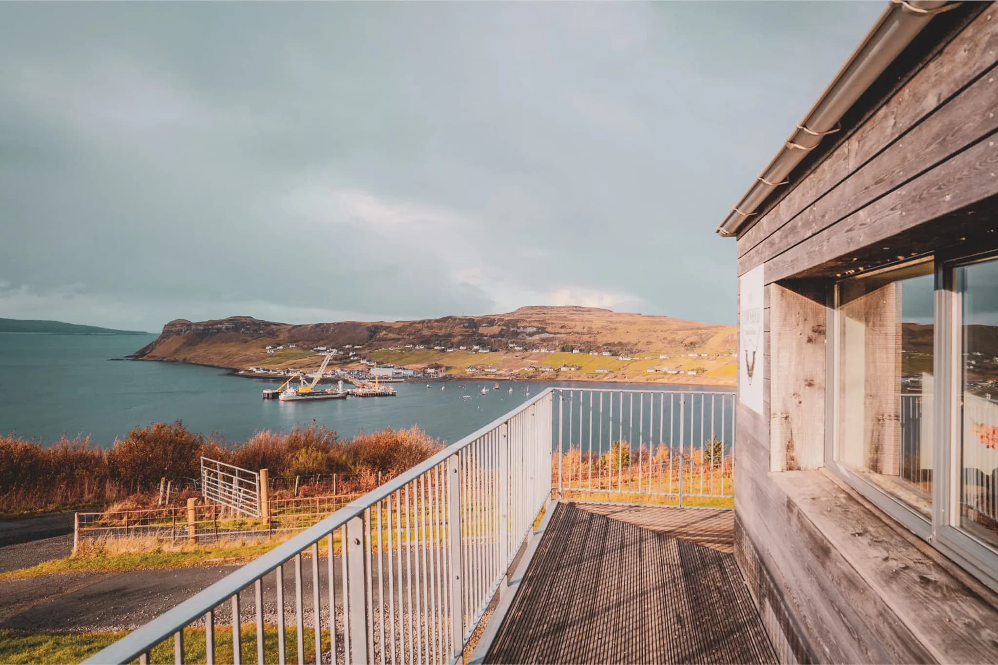 Panoramic view of the Isle of Skye, between sea, green hills and charming villages.