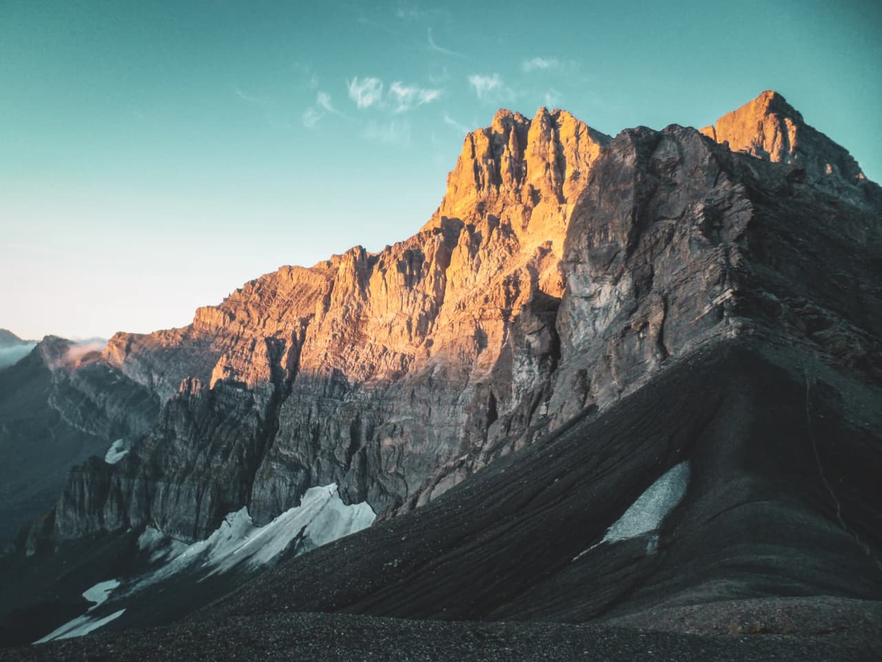 A magnificent sunlit summit of the Dents du Midi, with breathtaking Alpine scenery.
