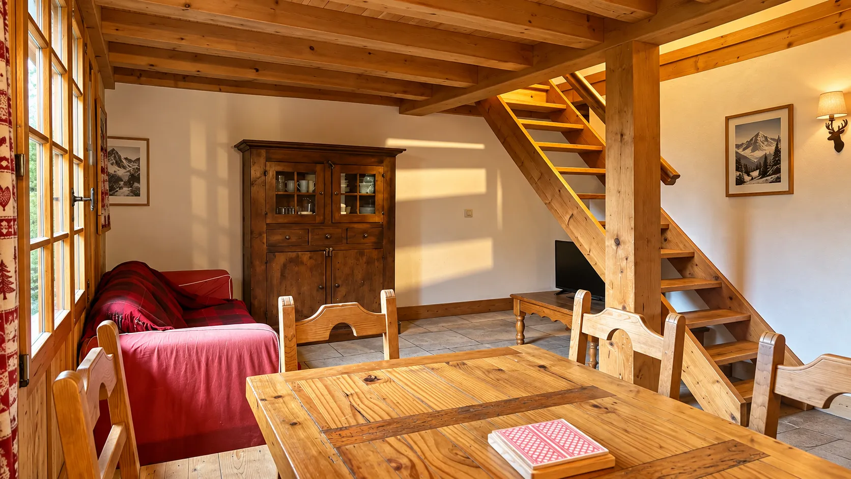 A cosy wooden lounge with views of the mountains, perfect for relaxing after a day’s mountaineering.