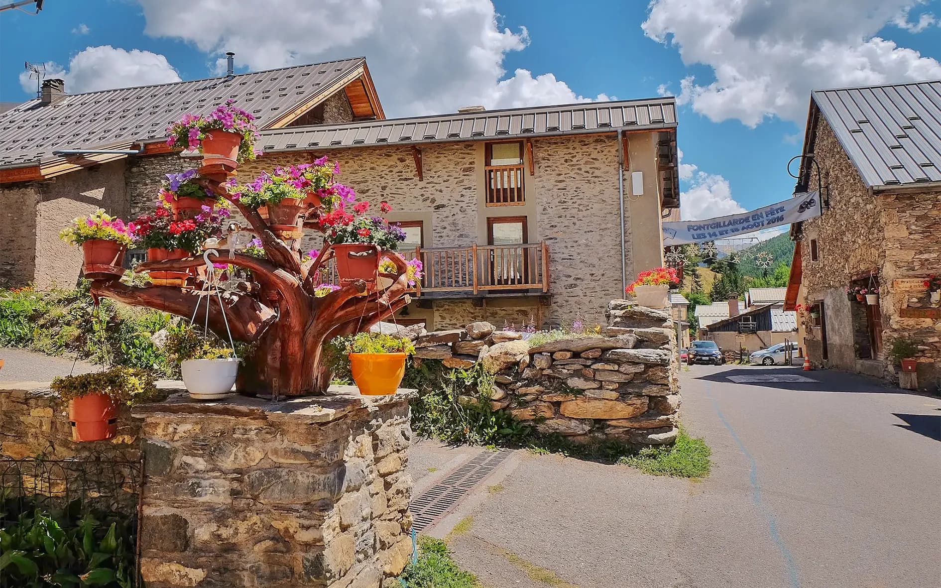 Charming alpine village with colourful flowers, ideal for a rejuvenating getaway.