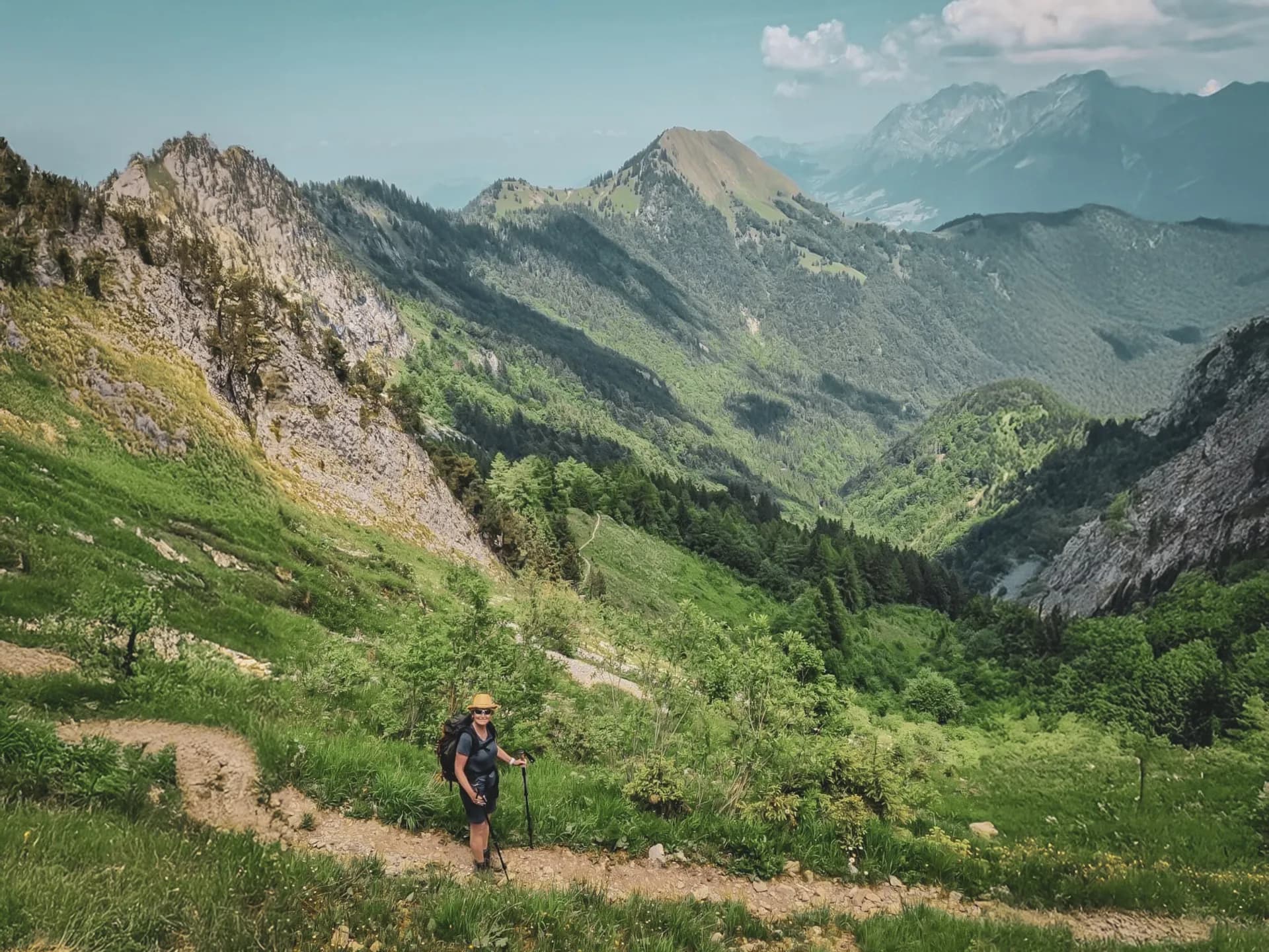 Nature walks in the Hautes Bauges, with mountains and lush greenery.