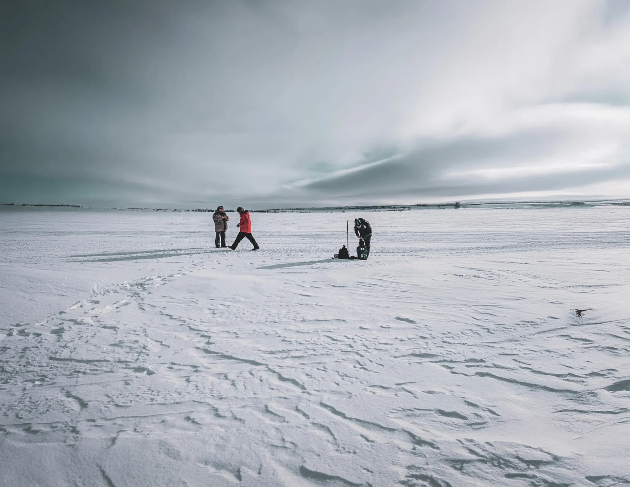 Two adventurers explore a snowy landscape, offering a magical escapade in Lapland.
