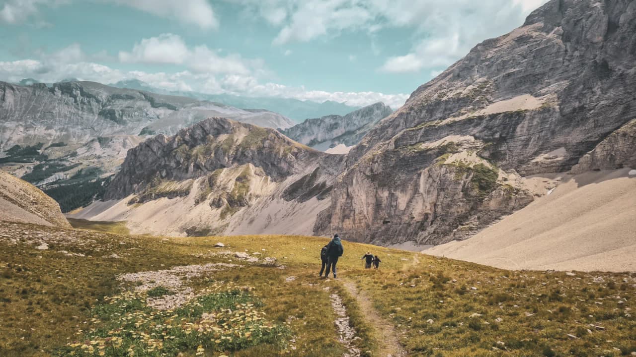 A hike through the majestic landscapes of the French Dolomites, between peaks and summits.