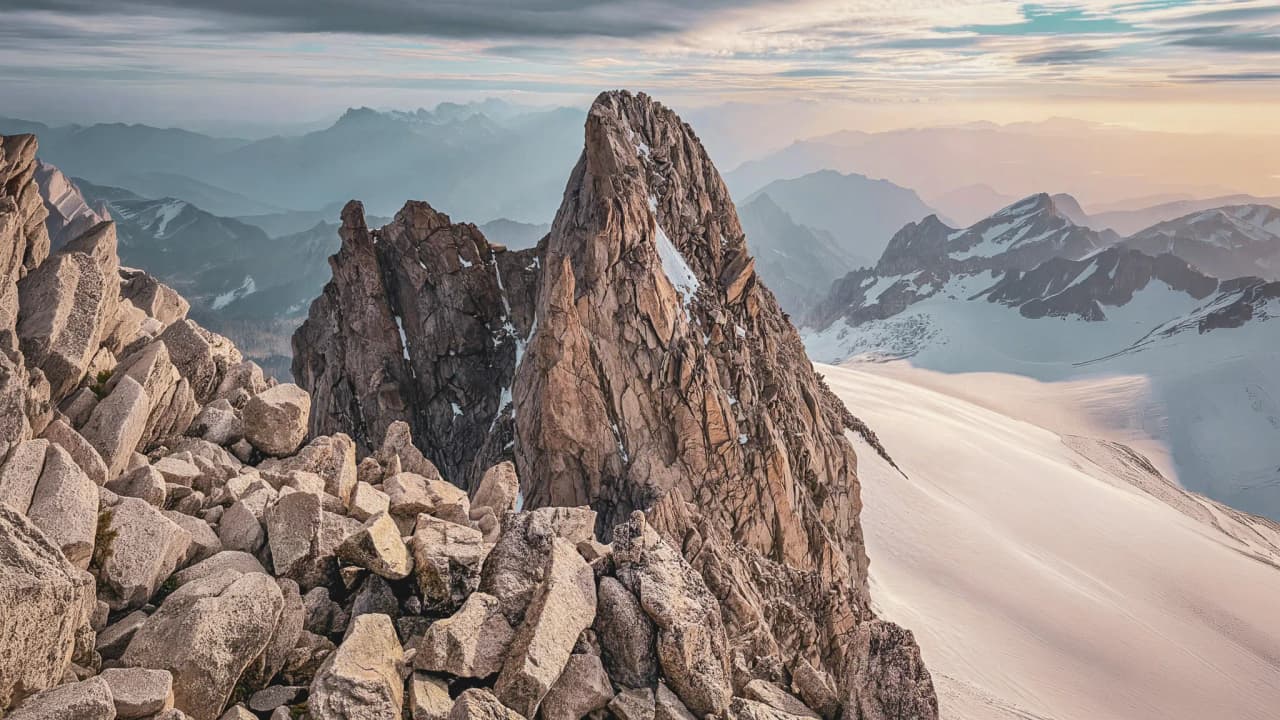 A majestic panorama of the Alpine peaks, set amongst rocks and glaciers, beckons you to set off on an adventure.