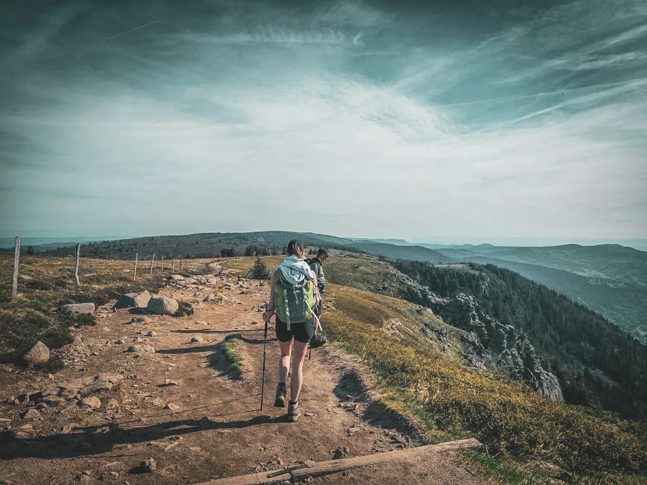 A hike along the crests of the Vosges mountains, with rocky paths and soothing panoramic views.