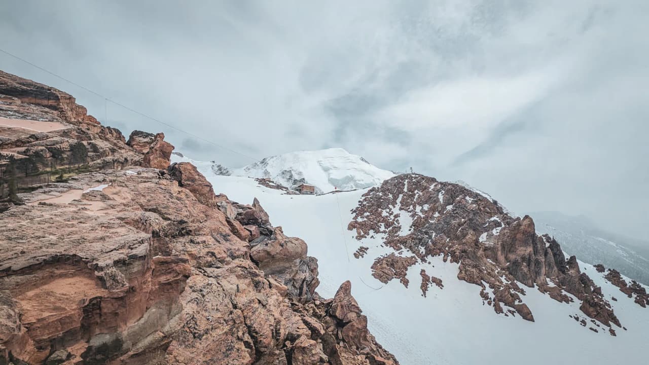 The majestic landscape of Mont Blanc, with its impressive rocks and snow, beckons you to embark on an alpine adventure.