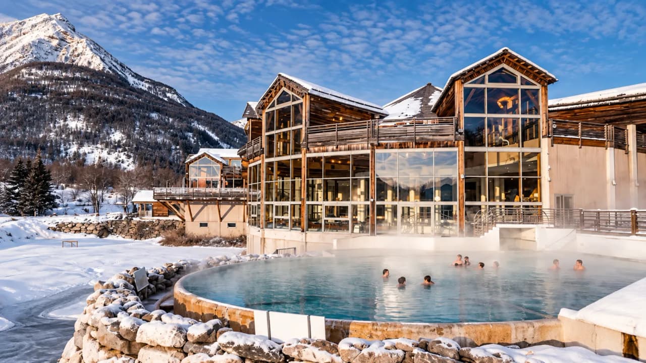 An open-air spa with views of the snow-capped mountains, ideal for unwinding after a workout.
