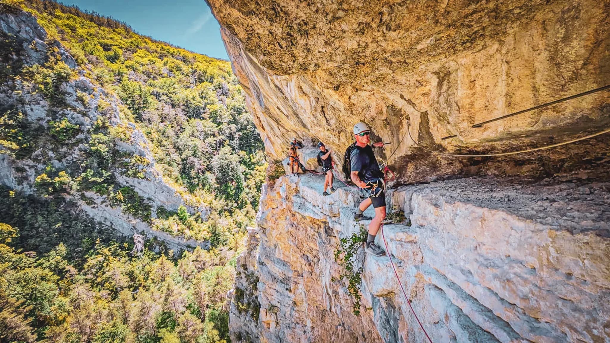 Climbing Mont Aiguille: adventurers on a spectacular ridge, breathtaking natural views.