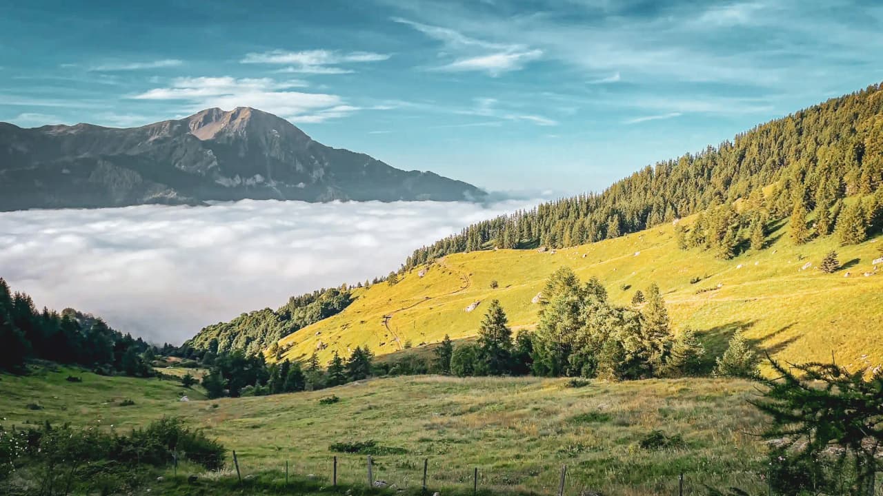 The Écrins landscape, with its majestic mountains and airy mist, is an invitation to adventure in the great outdoors.