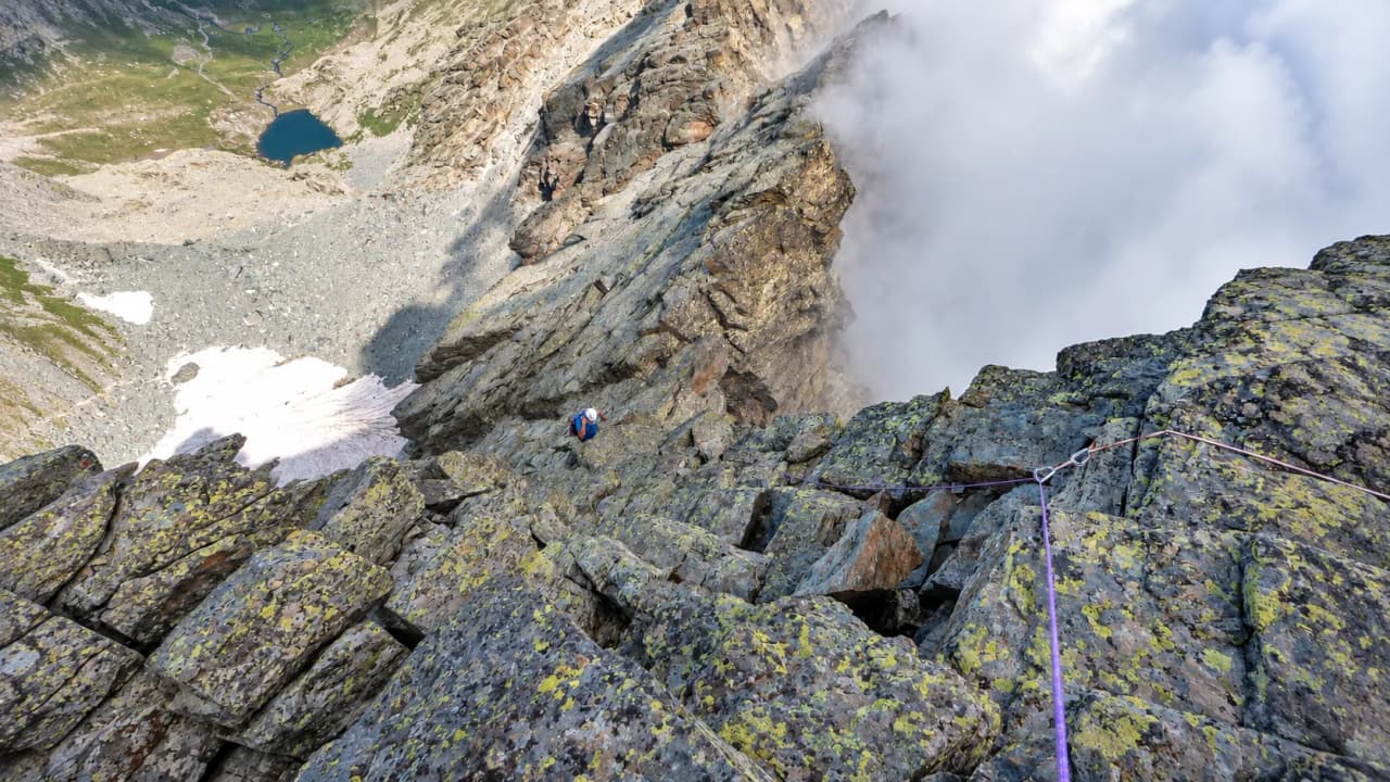 An impressive climb up Mount Viso, with colourful rocks and majestic alpine scenery.