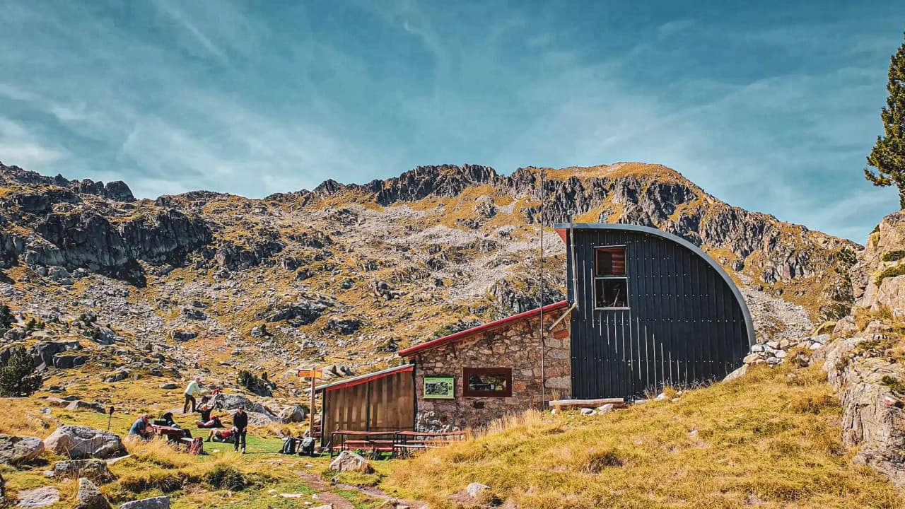 Mountain hut in the Pyrenees, surrounded by spectacular scenery and flower-filled valleys.