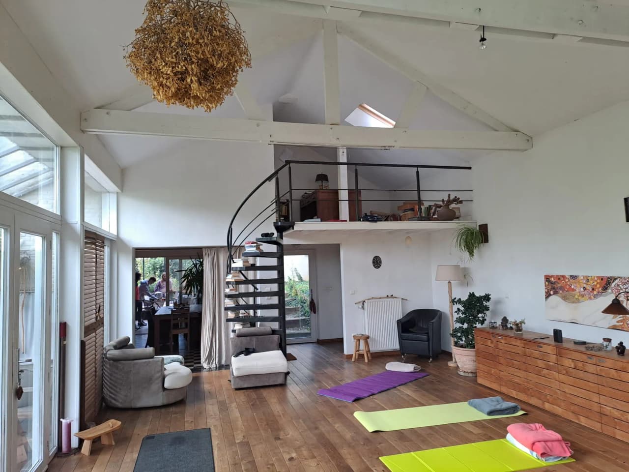 A bright, welcoming space for yoga, with spiral staircases and a Zen atmosphere in Durbuy.