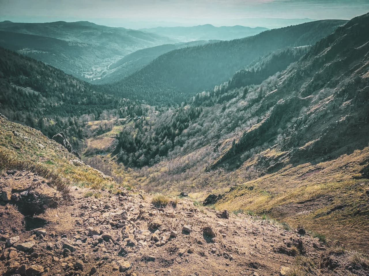 Panoramic views of the Vosges, lush green valleys and rocky ridges that invite adventure.