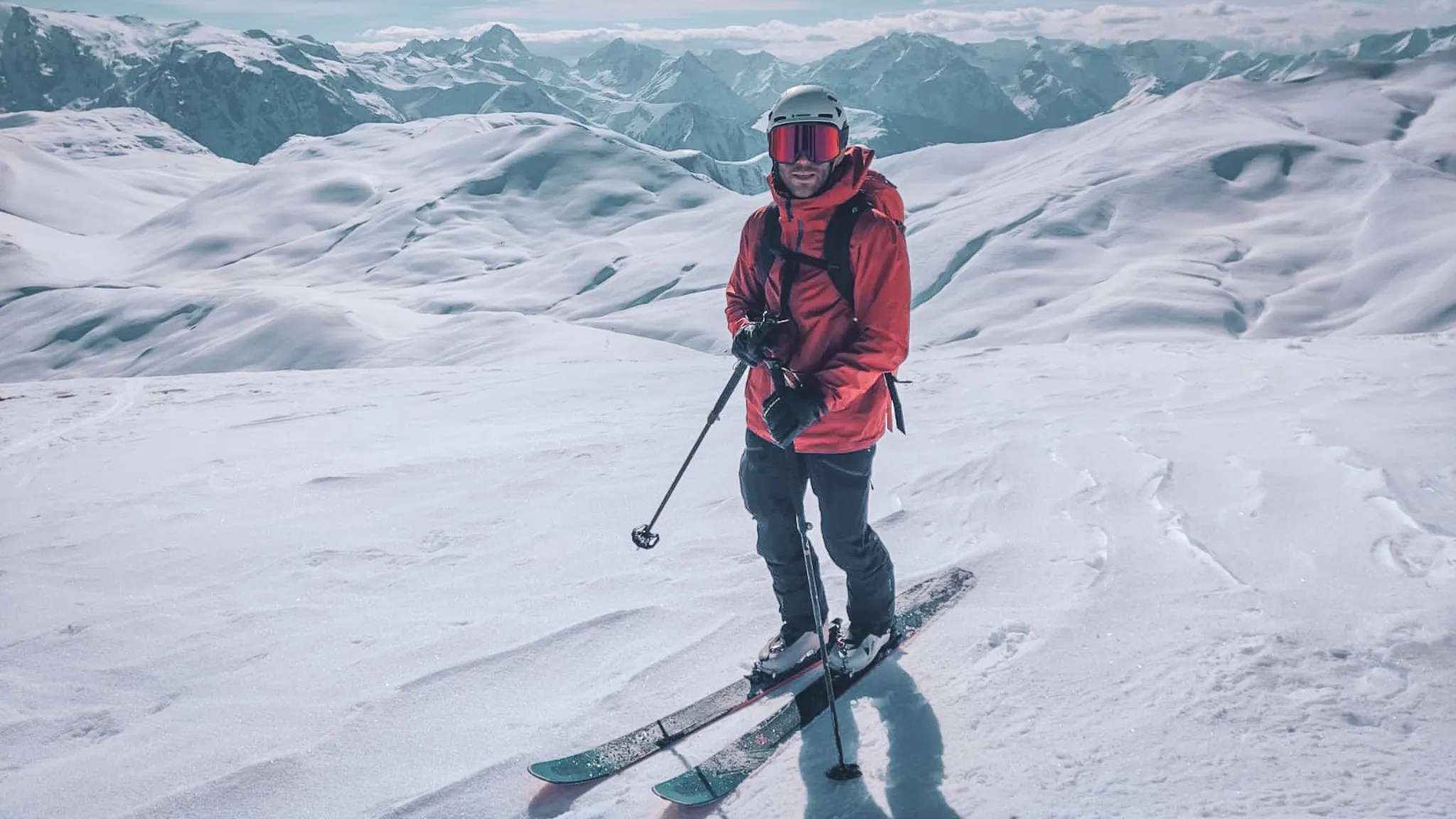 A winter landscape at La Grave, with majestic mountains and snow-covered slopes.