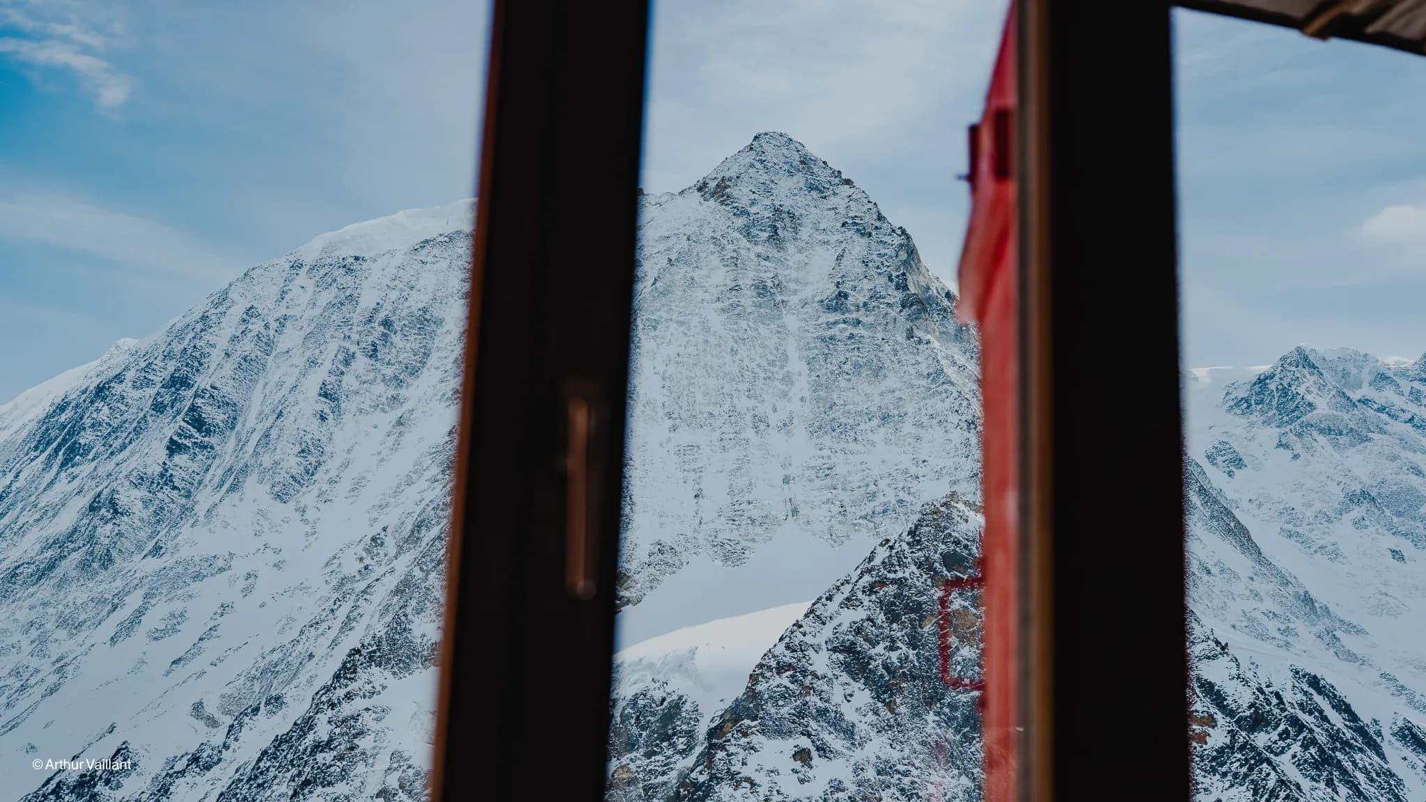 A majestic view of the snow-capped peaks of the Alps, inviting you to enjoy outdoor adventures.