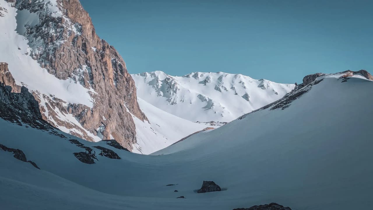 A majestic panorama of the snow-capped Cerces mountains, an invitation to a winter adventure.