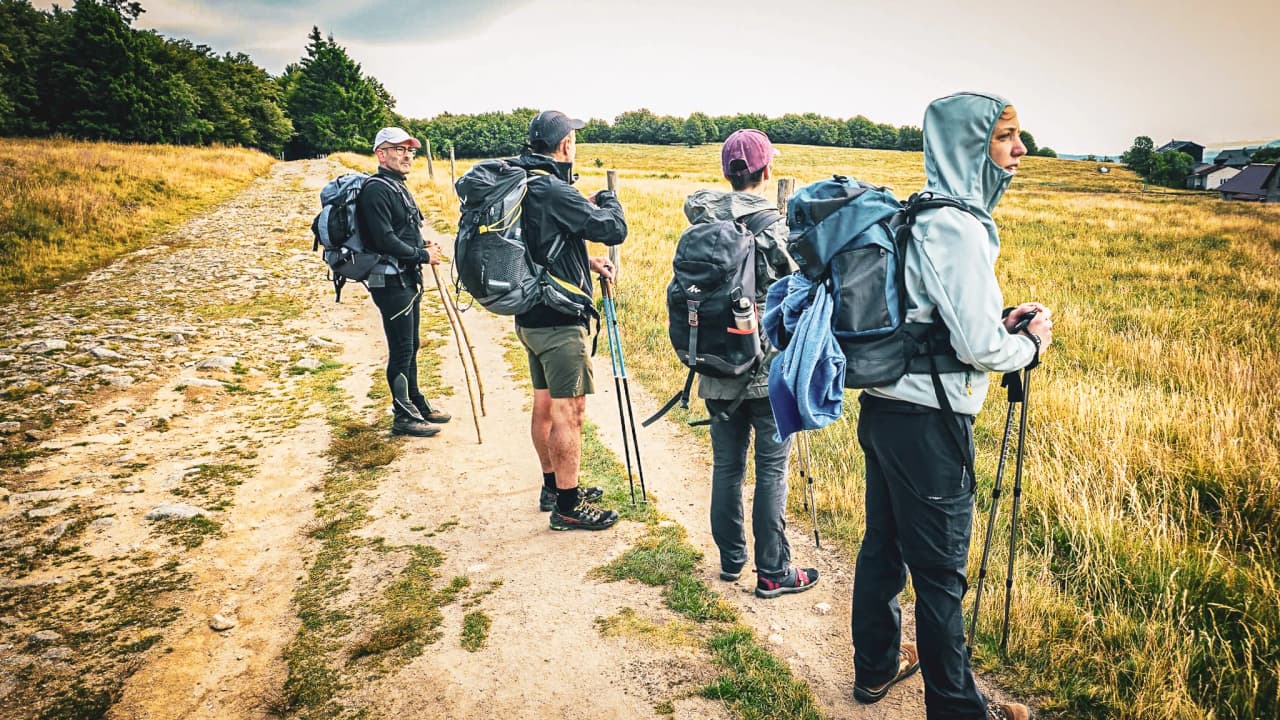 A group of hikers on a trail in the Vosges, ready for a mountain adventure.