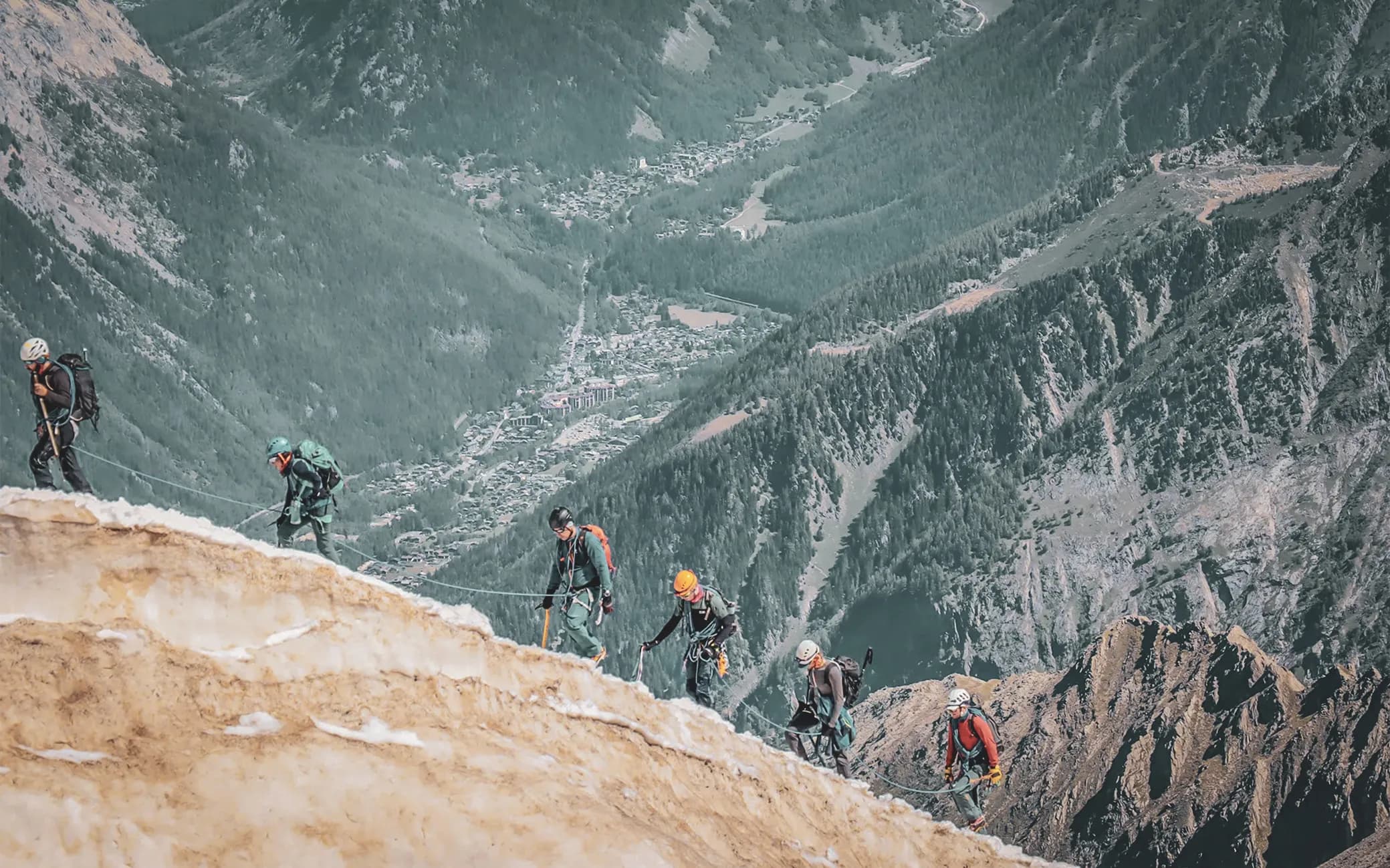 Climbers on their way to the summit, surrounded by the majestic mountains of Chamonix.