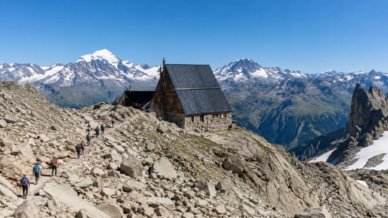 Alpine hiking with majestic mountains and a Mountain hut in the heart of Chamonix.