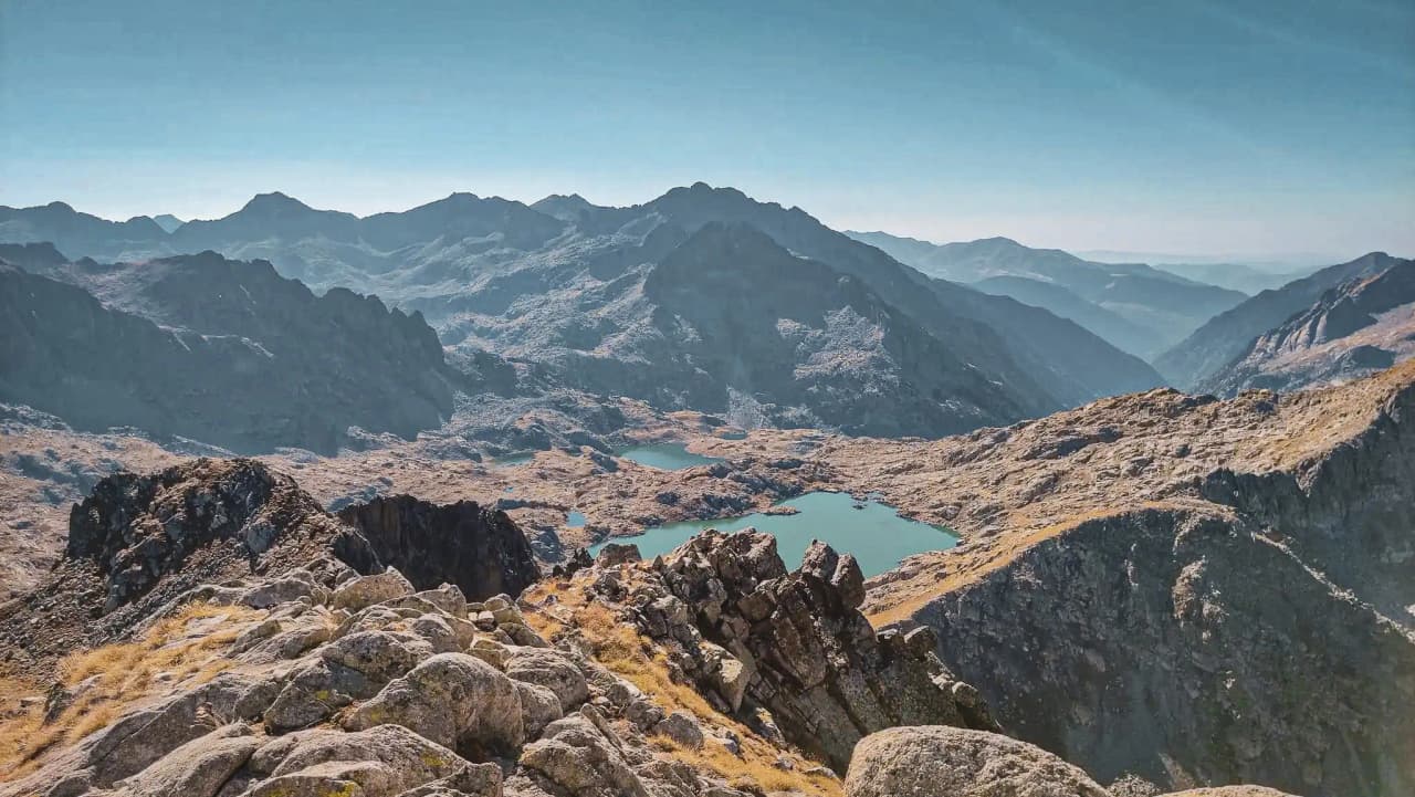 Majestic views of the Pyrenees, turquoise lakes and wind-sculpted ridges.