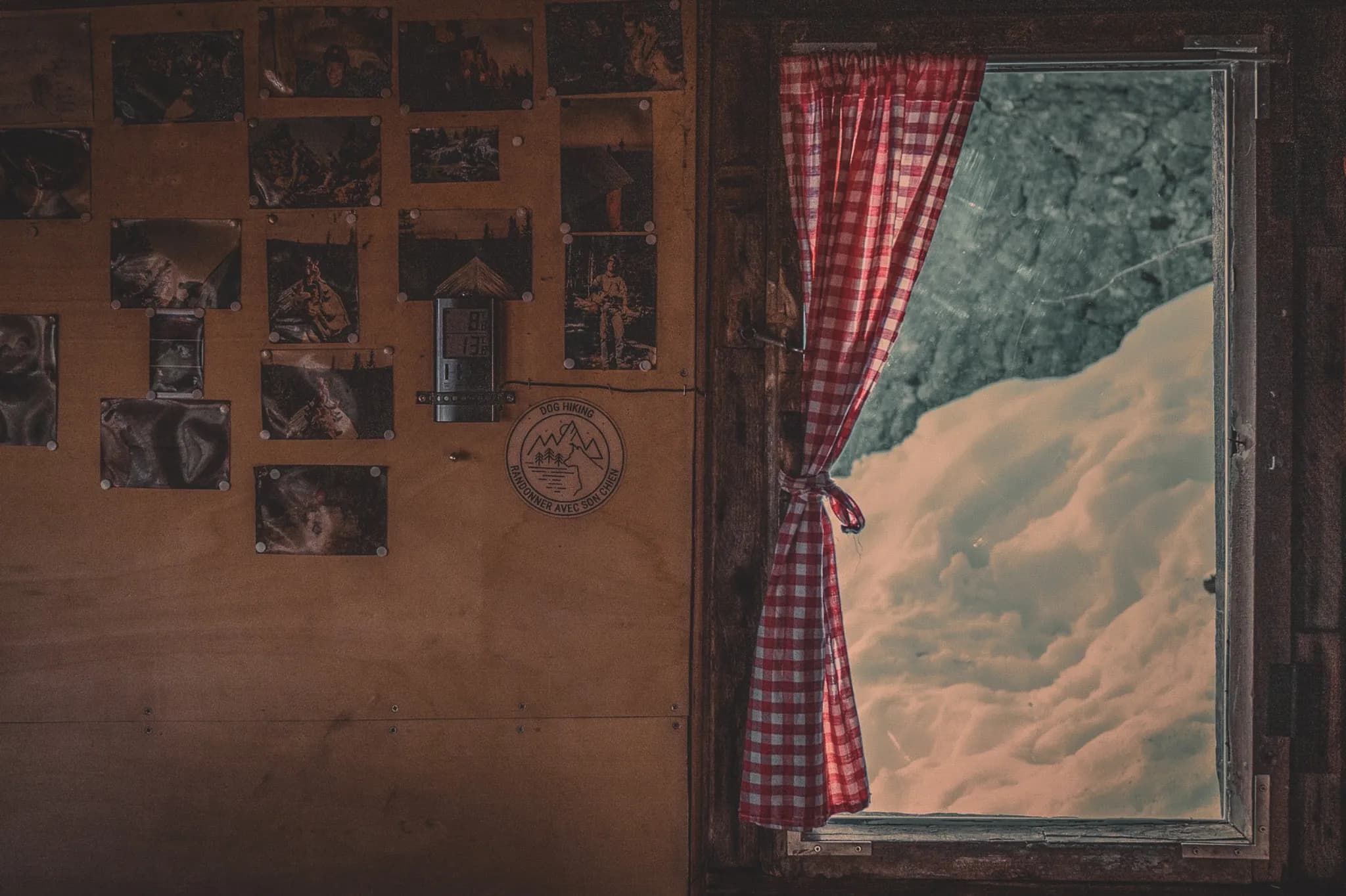 A cosy interior with a window looking out onto a snow-covered landscape, inviting you to embark on a winter adventure.