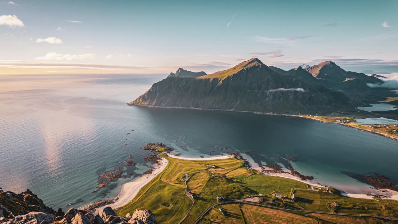 Breathtaking views of the Lofoten Islands, lined with majestic mountains and peaceful beaches.