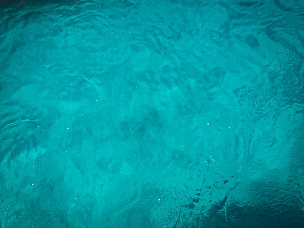 Crystal-clear turquoise waters that invite you to get away from it all and explore the beaches of the Balearic Islands.